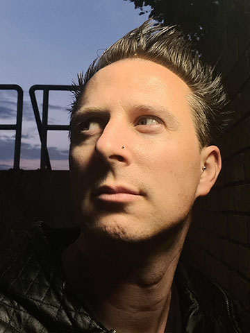 Promotional headshot photo of Jez Kemp